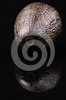 avocado over black background