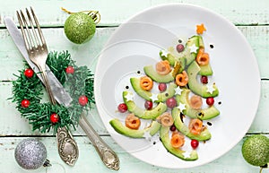 Avocado salmon salad shaped Christmas tree