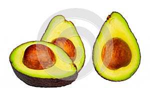 Avocado with seed isolated on white background. Source of omega 3 from natural food. Healthy food for baby. Half pieces of avocado