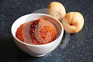 Avocado seeds and seed powder in a cup isolated