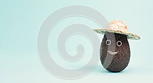 Avocado with a smiling happy face and a hat, vegan food, healthy diet, vegetarian lifestyle