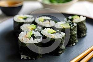 Avocado sushi roll board. Generate Ai