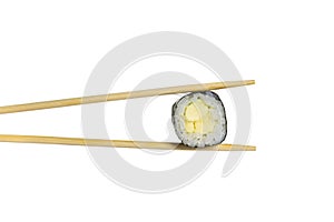 Avocado sushi roll sushi roll in chopsticks isolated