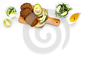 Avocado toast for light healthy breakfast on white background top view copy space