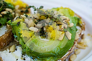 Avocado toast with pine nuts