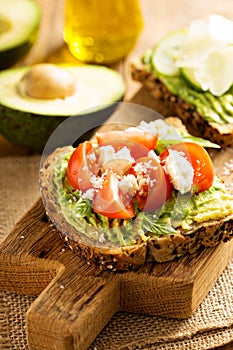 Avocado toast with tomatoes and feta