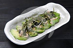 Avocado Tuna Salad with white radish sprouts