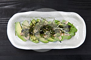 Avocado Tuna Salad with white radish sprouts