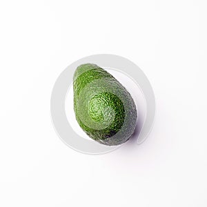 Avocado on white background, top view.