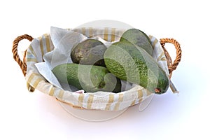 Avocadoes in a basket
