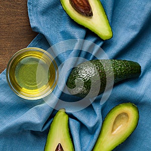 Avocadoes on blue