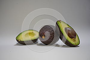 Avocados presented on white background
