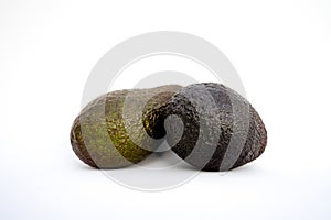 Avocados presented on white background