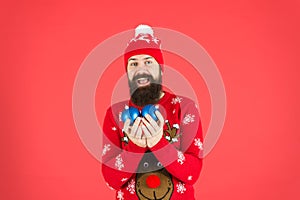 Avoid overwhelming anxiety when faced with holiday stressors. Winter decorations. New year. Hipster cheerful bearded man