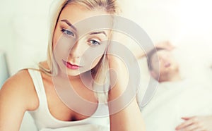 Awake woman having insomnia in bed