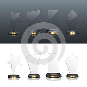 Award trophy set. Star and rectangle shaped glass prize statues on white and black background. Champion glory in