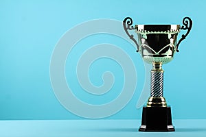 Award winning trophy in blue background