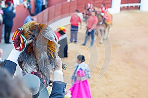 Bullfighter awarded with a rooster photo