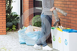 Aware person segregating household waste