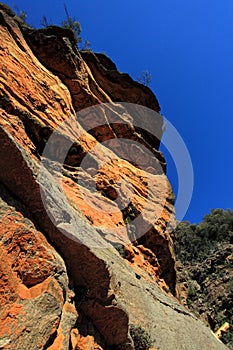 Awe inspiring red cliffs along the National Pass - Australia