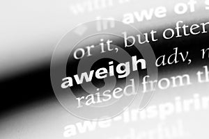 Aweigh word in a dictionary. aweigh concept. photo