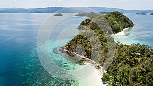 Awesome aerial view of isolated islands in the Philippines. Island hopping tour in Port Barton, Palawan