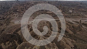 Awesome aerial view of rock formations called the Fairy Chimneys in Cappadocia, Turkey. Action. Fabulous landscape of