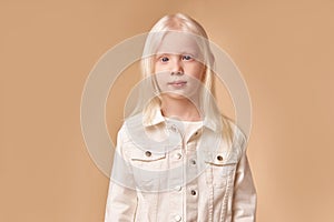 Awesome albino kid with blonde hair, isolated