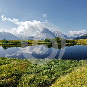 Awesome alpine highlands in summer in Dolomites Alps. Scenic image of famous Sassolungo peak. Splendid landscape in Val Gardena on