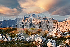 Awesome alpine highlands in sunny day. Scenic image of fairy-tale Landscape with colorful sky under sunlit, over the Dolomites