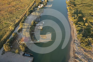 Awesome Drone view of fishing huts in the river