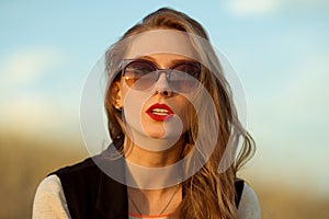 Awesome,gorgeous,attractive,striking,attractive opened-mouth girl with sunglasses outdoors