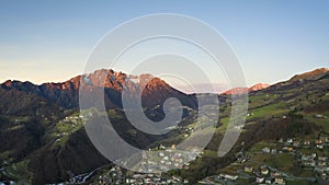 Awesome landscape photo of the Seriana valley and its mountains at sunrise