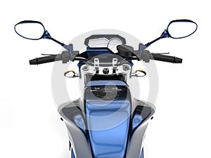 Awesome metallic blue modern motorcycle - in the seat view