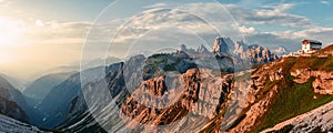 Awesome Nature Landscape. Amazing Dolomite Mountains Landscape during sunset. Incredible view of Dolomites Alps. Tre Cime di