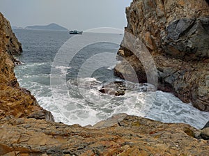Awesome nature stones beach Resorvoir mountain Sea Wave in Hong Kong Shek O Cape D& x27;Aguilar marine Reserve