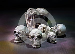 Awesome, pile of skull,on floor and in cup,