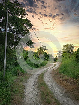 Awesome scene of the sky rural countryside pathway photo