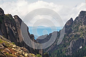 Awesome scenic view to great mountains in distance behind deep gorge