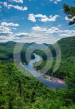 Awesome summer view from a verdant hill in Jacques Cartier National Park, Quebec province, Canada