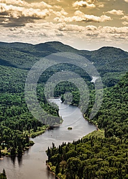 Awesome summer view from a verdant hill in Jacques Cartier National Park, Quebec province, Canada