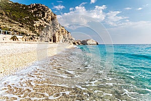 Awesome Sunny seascape. Beach and waves and perfect sky. Summer view of Kathisma Beach. Wonderful nature scene of Lefkada Island,