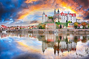 Awesome view on Albrechtsburg castle and cathedral on the River Elbe with dramatic  sunset