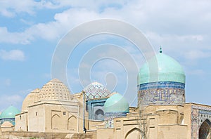 Awesome view of the Shah-i-Zinda Ensemble in Samarkand, Uzbekistan. Mausoleums decorated by blue tiles with designs. The