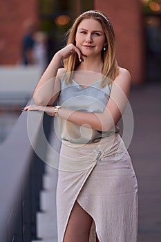 Awesome wider portrait of smiling young attractive girl with smooth blurred background