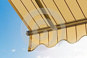 awning against blue sky