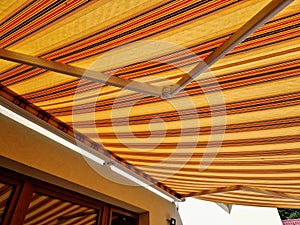 Awnings underline architectural appearance of your house.