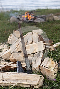 Ax and a pile of firewood