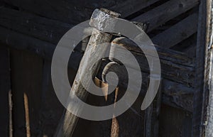 Ax, placed in rastel, metal in the sun