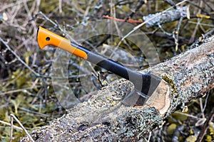 An axe and chainsaw